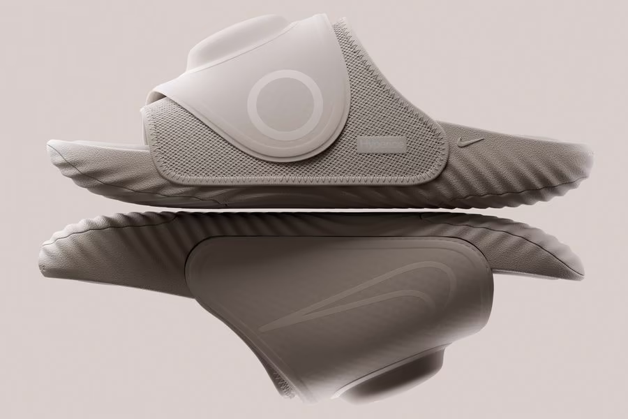 Слайды для восстановления Nike Air Zoom Hyperslide с интегрированным круглым блоком управления подогревом и фиолетовым индикатором.
